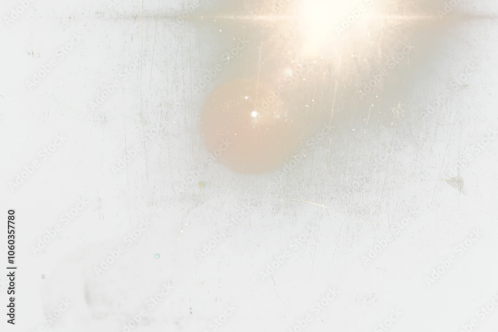 Poster Abstract transparent  image of a bright light shining through a scratched and dirty window.