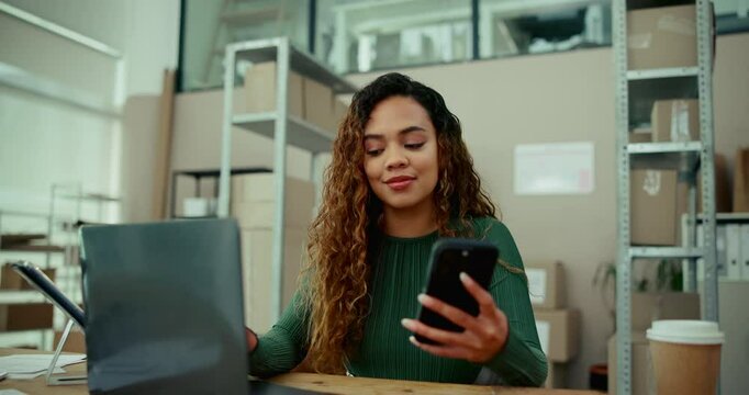 Woman, order logistics or phone with laptop for supply chain, inventory or ecommerce at warehouse. Online shopping, information or distributor with smile or mobile app for package delivery or service