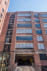 Fototapeta premium The glass windows reveal a glimpse of the city's bustling heartbeat within, Ponce City Market, Atlanta, Georgia, United States of America