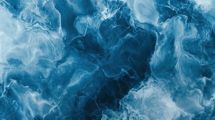 Obraz premium Abstract blue marble background with flowing patterns of white veins and rich blue hues,