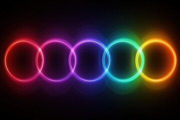 A vibrant display of colorful circles in a gradient of neon hues against a dark background.