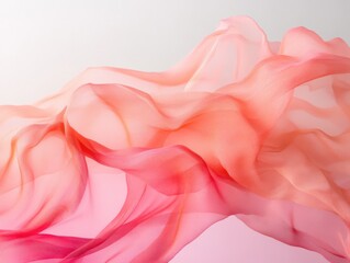 Colorful silk fabric flowing gracefully against a white isolated background.