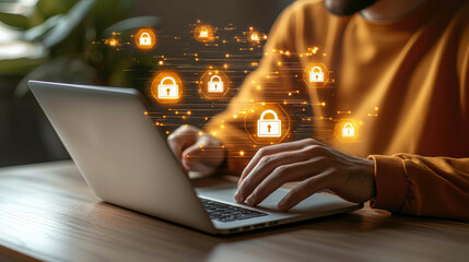 A person using a laptop with virtual security locks, symbolizing data protection and cybersecurity.