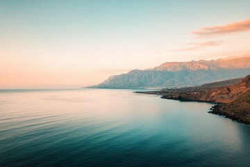 Fototapeta premium A serene sunset scene over the ocean on a cloudy day, perfect for travel or nature-themed projects. Beautiful simple AI generated image