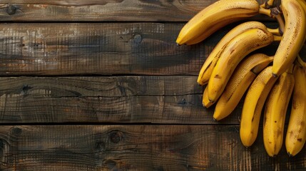 Bananas on Wooden Table Arranged with Space for Text