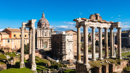 Scenic view to the hearth of Forum Romanum with ancient ruins of temple of Saturn, Umbilicus,...