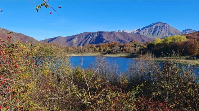 Panoramic view of Campotosto lake embedded in the Gran Sasso and Monti della Laga National Park, Abruzzo, Italy