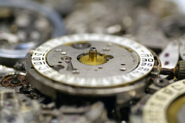Old mechanical watches with gears and cogs. Watch or clock mechanisms