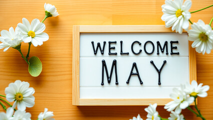 welcome may sign with white flowers