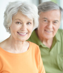 Happy, portrait and elderly couple in home with romance for marriage connection on weekend together. Senior man, woman and relax with love in commitment for retirement support, joy and bonding