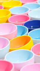group colorful plastic bowls arranged a playful