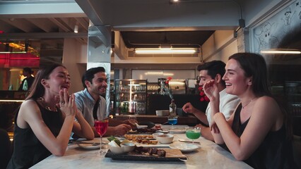 Group friend or couple enjoy drinking cocktail while waitress serving special grill meat tasty smelling good savory in featuring unique chef table dinning experience at luxurious restaurant. Vinosity.