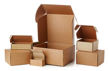 Stacked brown cardboard boxes in various sizes arranged on a white background