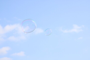soap bubbles on blue sky