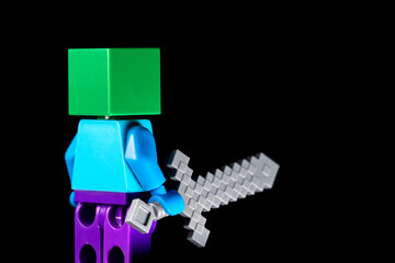 Naklejka premium LEGO Minecraft mob with green head and sword in his hand
