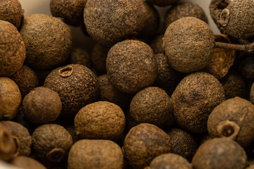 allspice close-up, pile of whole allspice, texture , macro.