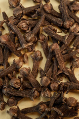 Dried cloves closeup. Vertical macro photo.