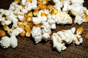 popcorn close up. popcorn with selective focus. popcorn, corn grains on a wooden table