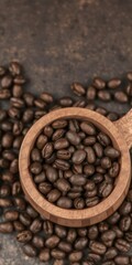 Fototapeta premium A wooden cup filled with roasted coffee beans on a table, coffee break