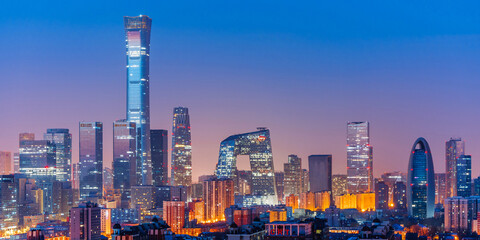 Obraz premium High angle night view of the Beijing Guomao CBD architectural complex in China