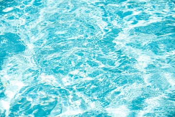 Blue ripped water in swimming pool, water pool texture and surface water backgraund.