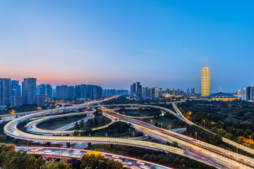 Obraz premium Night view of CBD and overpass in Zhengdong New District, Zhengzhou, Henan Province, China
