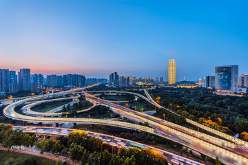 Fototapeta premium Night view of CBD and overpass in Zhengdong New District, Zhengzhou, Henan Province, China