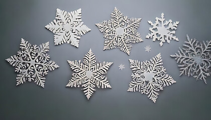 create winter artwork grey background featuring delicate snowflake designs personal use