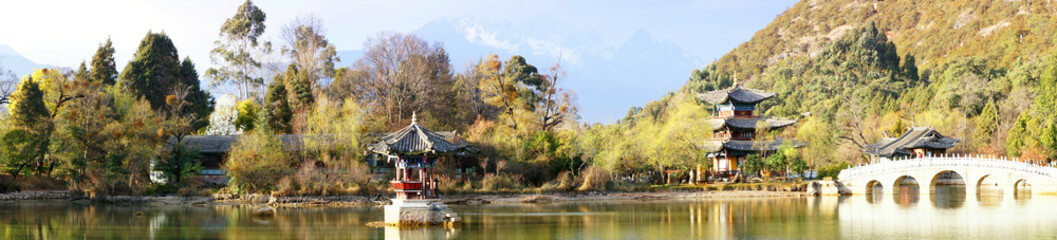the historic park Black Dragon Pool in the china yunnan with chinese traditional design  in lijiang old town, the world heritage site of UNESCO, 