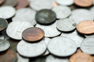 Big pile of United States USD currency silver and bronze coins. American money. Financial and business concept