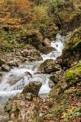 gorge with a river in the mountains, blue water, blue river, waterfalls, rocks and mountains
