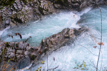 gorge with a river in the mountains, blue water, blue river, waterfalls, rocks and mountains