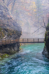 gorge with a river in the mountains, blue water, blue river, waterfalls, rocks and mountains