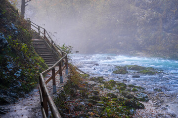 gorge with a river in the mountains, blue water, blue river, waterfalls, rocks and mountains