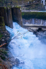 gorge with a river in the mountains, blue water, blue river, waterfalls, rocks and mountains