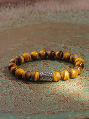 Black Obsidian stone bracelet , Chinese men's modern retro style fashion. Isolated on white background