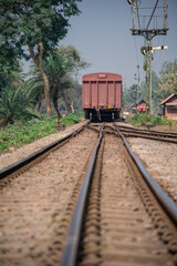 Obraz premium Vintage Freight Car on Railway Tracks