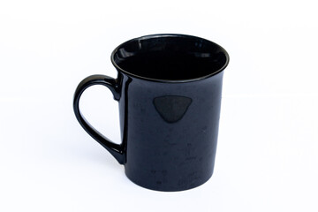 Black ceramic cup on white background