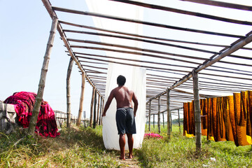 Drying Cloth 1
Some cloth that has been colored is dried in the sun