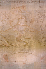 Scene of the Churning of the Milk Ocean carvings status on the wall of Angkor wat temple, world heritage, Siem Reap, Cambodia