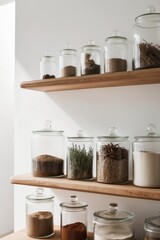 Glass jars filled with various dried ingredients on wooden shelves.