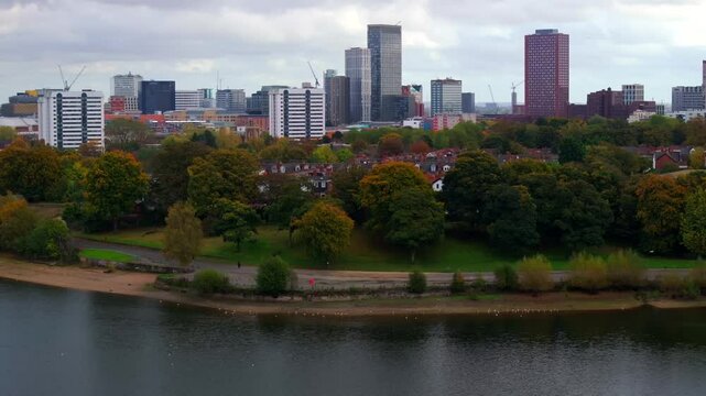 Birmingham skyline from the vantage point of Edgbaston Reservoir in Autumn  - England UK 