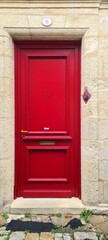 Bright Red Door in Modern Setting