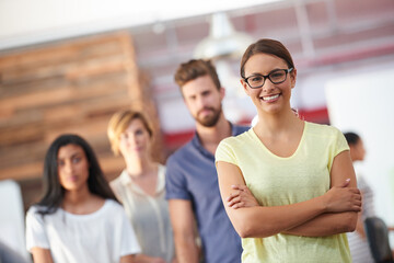 Portrait, leader and smile at office with pride for career growth and job opportunity as copywriter. About us, employees and people in confidence or happy for creativity, teamwork and collaboration