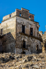 Abandoned ruins of the ghost town of Craco. A city abandoned due to an earthquake in the late 20th century. Province of Matera, Basilicata, Italy