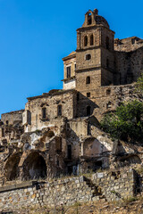 Abandoned ruins of the ghost town of Craco. A city abandoned due to an earthquake in the late 20th century. Province of Matera, Basilicata, Italy