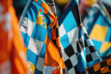 A bunch of flags waving in the wind, representing different countries or nations
