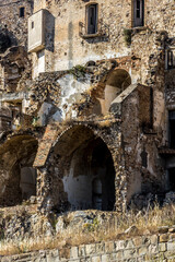 Abandoned ruins of the ghost town of Craco. A city abandoned due to an earthquake in the late 20th century. Province of Matera, Basilicata, Italy