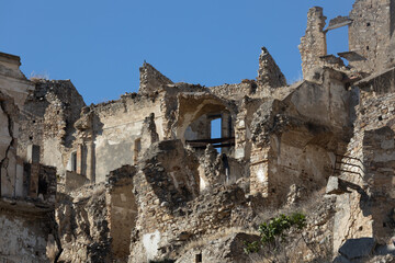 Abandoned ruins of the ghost town of Craco. A city abandoned due to an earthquake in the late 20th century. Province of Matera, Basilicata, Italy
