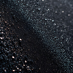 Obraz premium background in the form of a black sandpaper surface with shiny particles